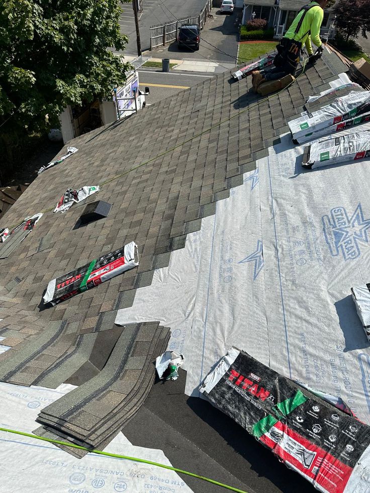 Roofing service by ARC American Remodeling and Construction